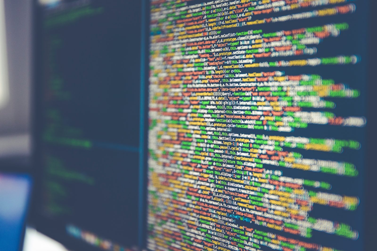 A computer screen with a lot of code on it.